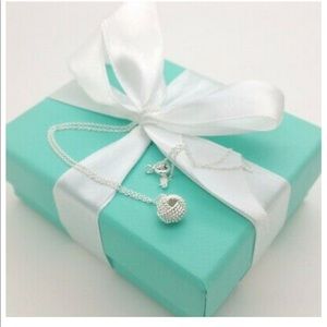 Tiffany & Co sterling silver 925 knot Pendant 16”